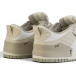 SB Dunk Low Disrupt 2 Pale Ivory Black - كوتشي من EG KICKS