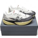 New Balance FuelCell Rebel v5 White Black Yellow sneakers at EG KICKS Egypt
