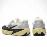 New Balance FuelCell Rebel v5 White Black Yellow sneakers at EG KICKS Egypt